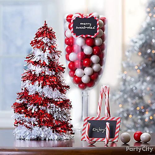 Instead of mason jars, fill the table with candy canes holder as Christmas decoration